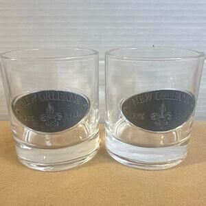 2 Americaware New Orleans whiskey glasses w/pewter a fleur-de-lis & "EST 1718"
